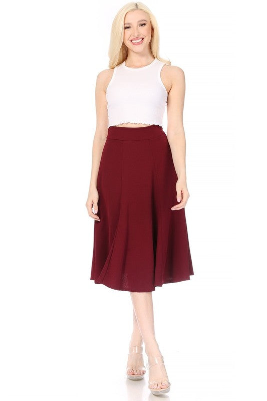 Paneled, A-line midi skirt with banded waist. Burgundy