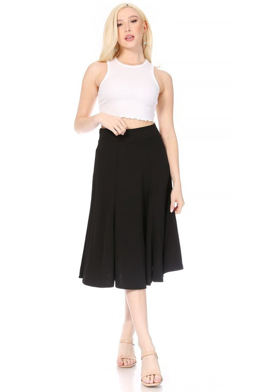 Paneled, A-line midi skirt with banded waist. Black