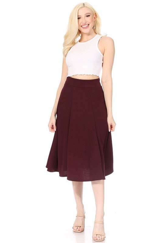 Paneled, A-line midi skirt with banded waist. Purple